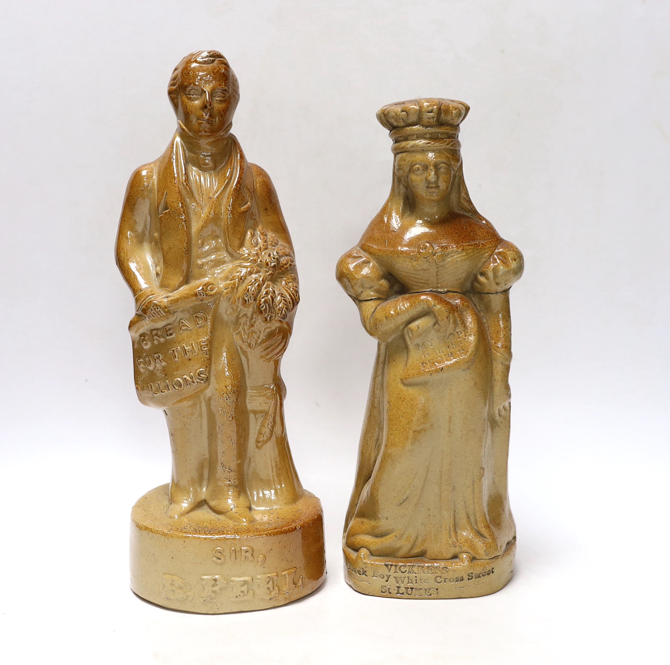 Two Victorian salt glaze spirit flasks, probably Lambeth, the first commemorating the repeal of the Corn Laws in 1846, modelled as Sir Robert Peel and the second modelled as Queen Victoria holding a scroll, impressed 